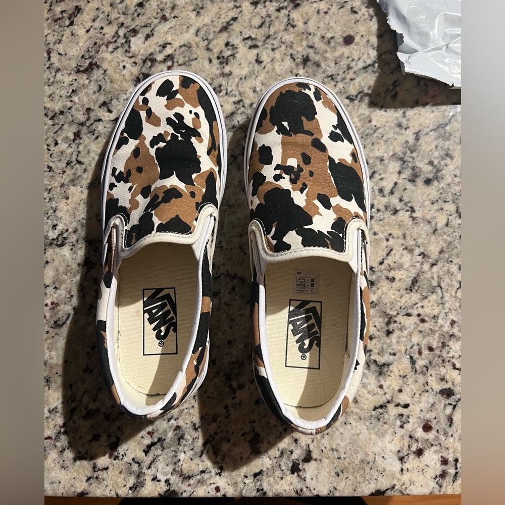Women’s cow print vans